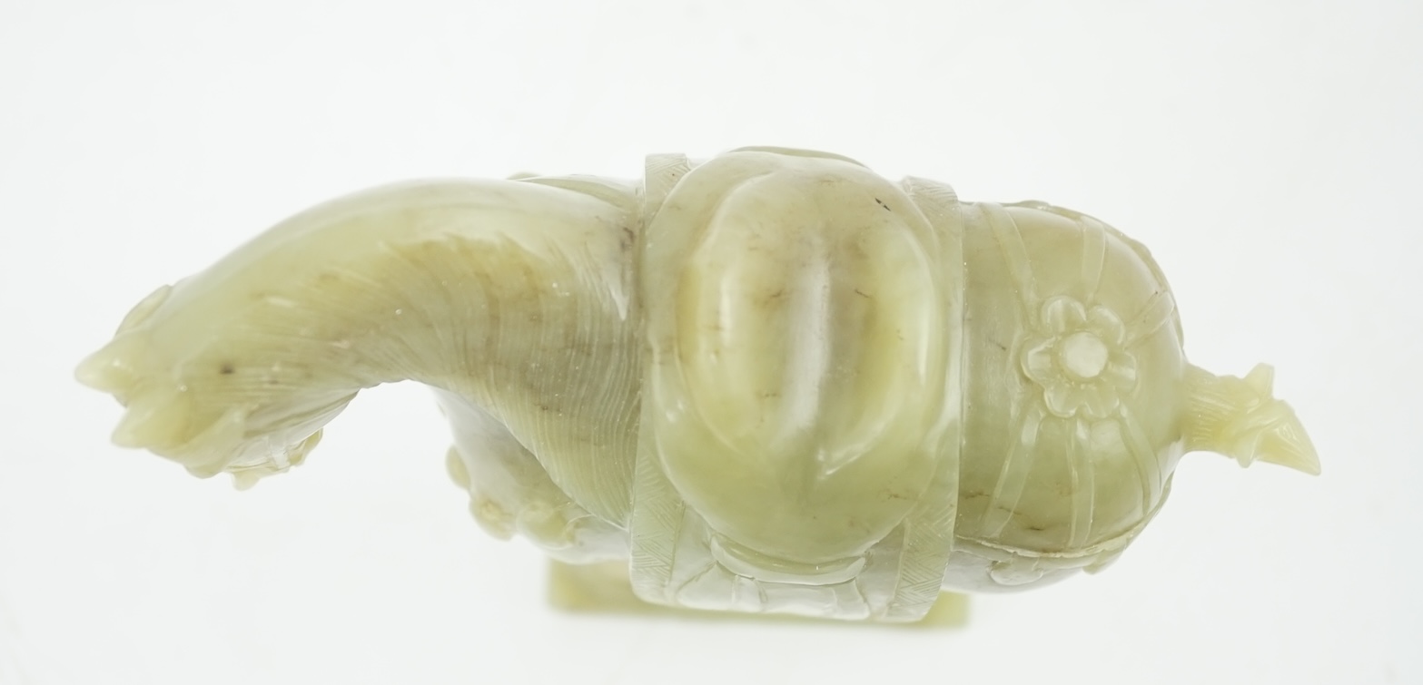 A Chinese celadon jade figure of a horse, early 20th century, 12cm high